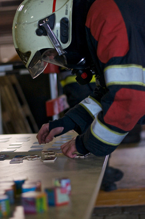 Puzzling firefighter with SCBA.